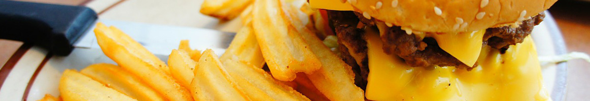 Eating Burger Fast Food at Tomlinson's Restaurant restaurant in Bridgeport, CT.